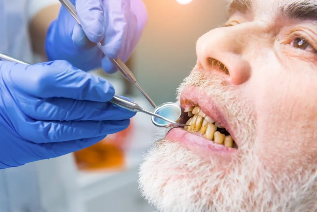 Root Canal 21 Dentist examining patient