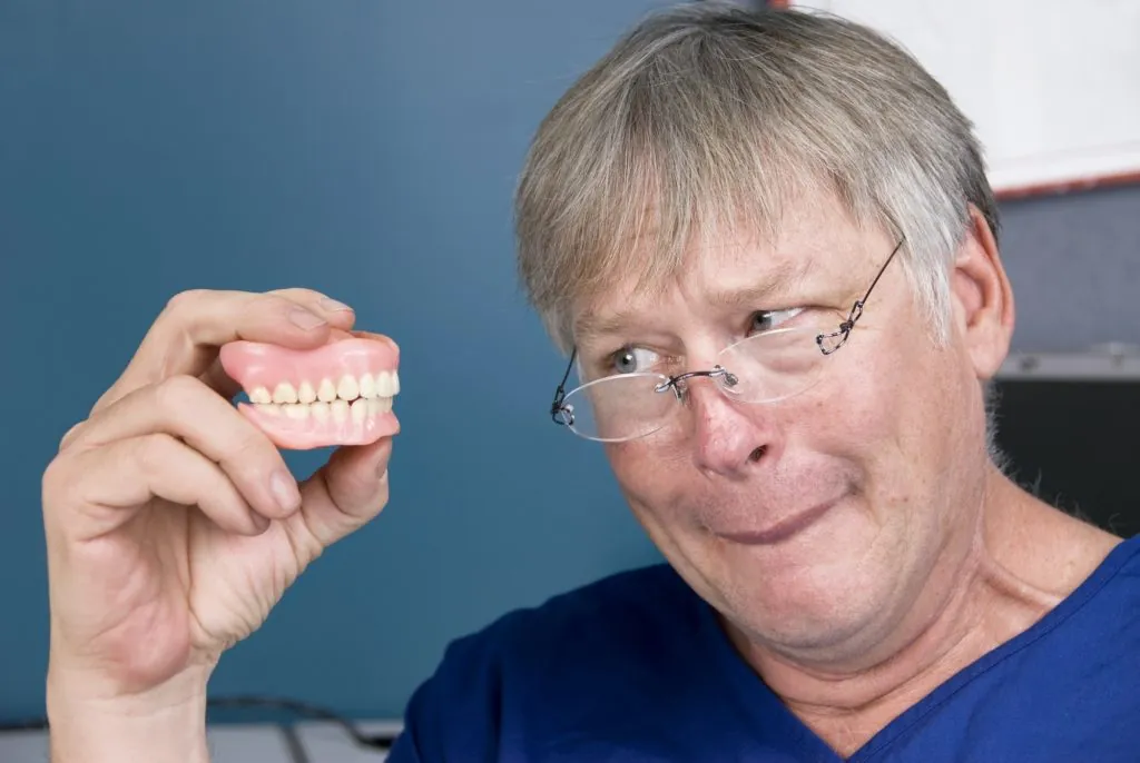 Dentures 19 Man with his dentures