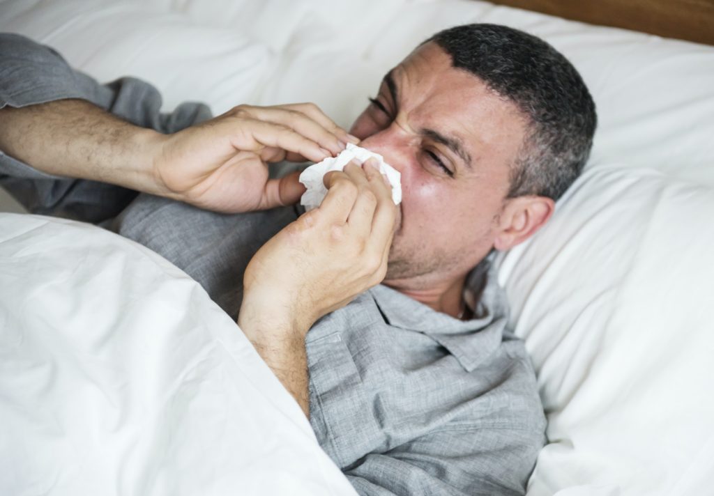 Man sneezing