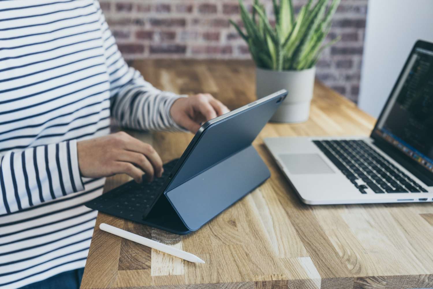 man with macbook